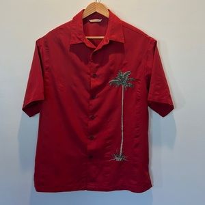 Men’s L Paradise Collection, Caribbean style camp shirt. Red/lone Palm tree.